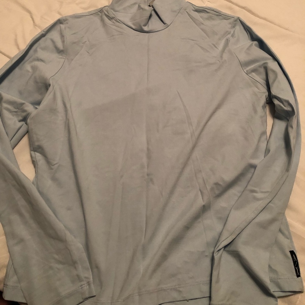 Sky blue tight fitted turtleneck